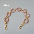 Detail view of 43cm pink marble resin and gold metal link chain strap for bags - Pink-43