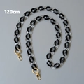 Detail view of 120cm black and clear acrylic chain with gold lobster clasps and rings - Black