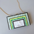 Women's acrylic evening clutch with green marble stripe pattern and gold chain strap - Green