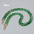 Macro detail of 80cm green and yellow marble acrylic fishbone chain with gold lobster clasps - Green 80cm
