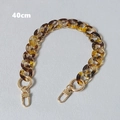 Close-up of 40cm amber tortoiseshell resin chain with gold spring clasps for handbags - Amber 40CM