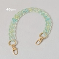 Detail of 40cm acrylic fishbone chain strap in green and yellow gradient with gold clasps - Green Two-Tone 40CM