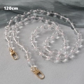 Macro view of 120cm acrylic bead crossbody chain with transparent pink beads and gold clasps - 120cm / Pink