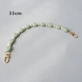 Détail d'une sangle en acrylique de 33cm avec perles carrées vertes et nacrées - Vert-33CM