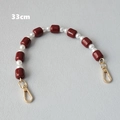 Detail of 33cm acrylic chain featuring dark red beads, pearls and gold lobster clasps - Red-33cm