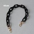 Detalle de la cadena negra de resina de 45cm para bolso con efecto mármol y cierres oro - 45cm / Blanco y negro mezclado