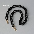 Detalle de la cadena de bolso de acrílico negro de 85cm con mosquetones de metal dorado - 85cm / Negro Puro
