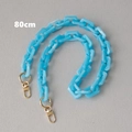 Detailed view of 80cm blue acrylic chain strap with marble texture and gold lobster clasps - 80cm / Blue