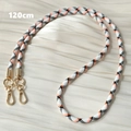 Detail of 120cm black, white, and orange braided crossbody phone strap with gold metal clasps - Black White Orange Color Block Braided (Style 8)