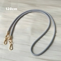 Detail view of 120cm gray woven phone strap featuring polished golden lobster clasps - Fine Gray Braided (Style 13)