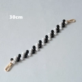Detail view of 30cm black and white pearl bag chain strap with gold metal lobster clasps - Black and White-30CM