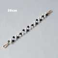 Dettaglio catena di 30 cm in perle bianche e nere con chiusure a moschettone dorate - Bianco e Nero Alternato-30CM