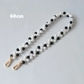 Dettaglio catena di 60cm in perle bianche e nere per borse con moschettoni in oro lucido - Bianco e Nero Alternato-60CM