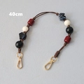 Detail of 40cm acrylic beaded strap with marble pattern beads and gold lobster clasps - Black (40cm)