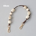 Detail of 40cm acrylic bead chain with marble texture and golden metal lobster clasps - Beige (40cm)