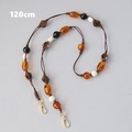 Detail of 120cm beaded acrylic strap with amber and black beads and gold lobster clasp - Amber (120cm)