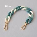 Detail view of a 28cm multi-color acrylic fishbone chain with golden lobster clasps - Dark Green/Light Green/Off-white Patchwork (Style-9)