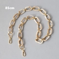 Close-up of 85cm marble beige acrylic bag strap with gold metal rings and lobster clasps - 85cm / Beige Gold Mixed