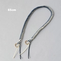 Detail view of 65cm navy and beige braided cord strap with gold metal ring buckles - Blue & White
