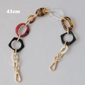 Detailed view of 43cm mixed acrylic bag chain with colorful resin links and gold clasps - Black & White Amber Transparent Patchwork (Style 5)