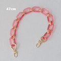Dettaglio catena per borsa in acrilico rosa da 47 cm con fermagli dorati - 47cm / Rosso