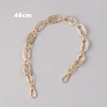 Detail view of 46cm acrylic shoulder strap with marble links and gold lobster clasps - 46cm / Beige