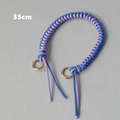 Detail of 35cm blue and purple woven bag handle strap with golden circular clasps - Blue & Purple