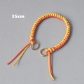 Detail view of 35cm braided wax rope handle for handbags with gold metal rings - Yellow & Orange Mixed