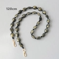 Detail of 120cm marble pattern acrylic bead chain with golden lobster clasps - 120cm