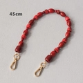 Detail of 45cm red acrylic beaded chain with golden lobster clasps for bags or phones - Olive and Cylindrical Style (Style 2) / 45cm