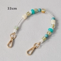 Detailed view of 33cm colorful acrylic beaded strap with golden metal lobster clasps - 33CM / Blue