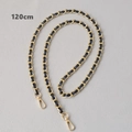 Close-up of a 120cm gold metal chain interwoven with black leather and lobster clasps - Navy Blue