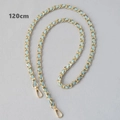 Detail view of 120cm gold metal chain interwoven with light blue PU leather strap - Sky Blue