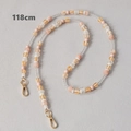 Detail van de 118 cm kleurrijke kralenketting van acryl met gouden karabijnsluitingen - 118cm / Roze