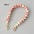 Detail view of 42cm pink marble acrylic bead chain with golden metal lobster clasps - 42cm / Pink White Marble (Style 1)