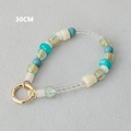 Detailansicht einer 30cm bunten Acryl-Perlenkette mit goldenem Federringverschluss-Haken - Teal Cream Perlenmix (2)