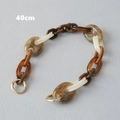 Detail van 40cm schildpad acryl tas ketting met gouden metalen ring sluitingen aan band - 40CM / Amber