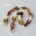 65cm acryl tassenriem met marmerpatroon schakels en gouden veerringsluitingen - 65cm / Amber