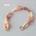 Detail van 40cm acryl tassenketting met perzikkleurige schakels en gouden sluitingen - 40CM / Roze
