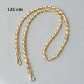 Dettaglio della catena in metallo dorato da 120 cm con pelle bianco crema e chiusure a moschettone - 120cm / Bianco Sporco