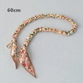 Detail view of 60cm silk scarf chain strap with gold metal links and floral pattern fabric - Cream Pink Orange Floral Style (4) / Gold