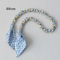 Detail of 60cm golden chain intertwined with light blue floral silk scarf for handbags - Style 4-Gold (Light Blue Small Floral)