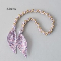 Detailed macro view of a 60cm gold chain strap interwoven with purple floral silk ribbon - Style 7-Gold (Purple Small Floral Bow)