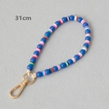 Detail view of 31cm colorful acrylic and heishi bead strap with gold lobster clasp - Blue-31CM