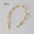 Detail of 48cm acrylic and gold metal chain strap accessory with lobster clasps - 48cm / Clear