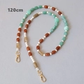 Détail de la chaîne de 120 cm en perles acryliques colorées avec fermoirs dorés - Série Verte-120CM