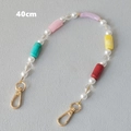Detail view of 40cm colorful acrylic beaded chain with gold lobster clasps and pearls - Purple Multi-40CM