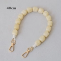 Dettaglio catena da 40cm con perline cubiche effetto marmo e chiusure dorate - Albicocca-40CM