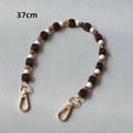 Detailed view of 37cm handmade bag strap with wooden and acrylic beads and gold clasps - Style 1 / 37cm