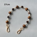 Detail of 37cm vintage handmade wooden bead chain with golden metal lobster clasps - Style 2 / 37cm